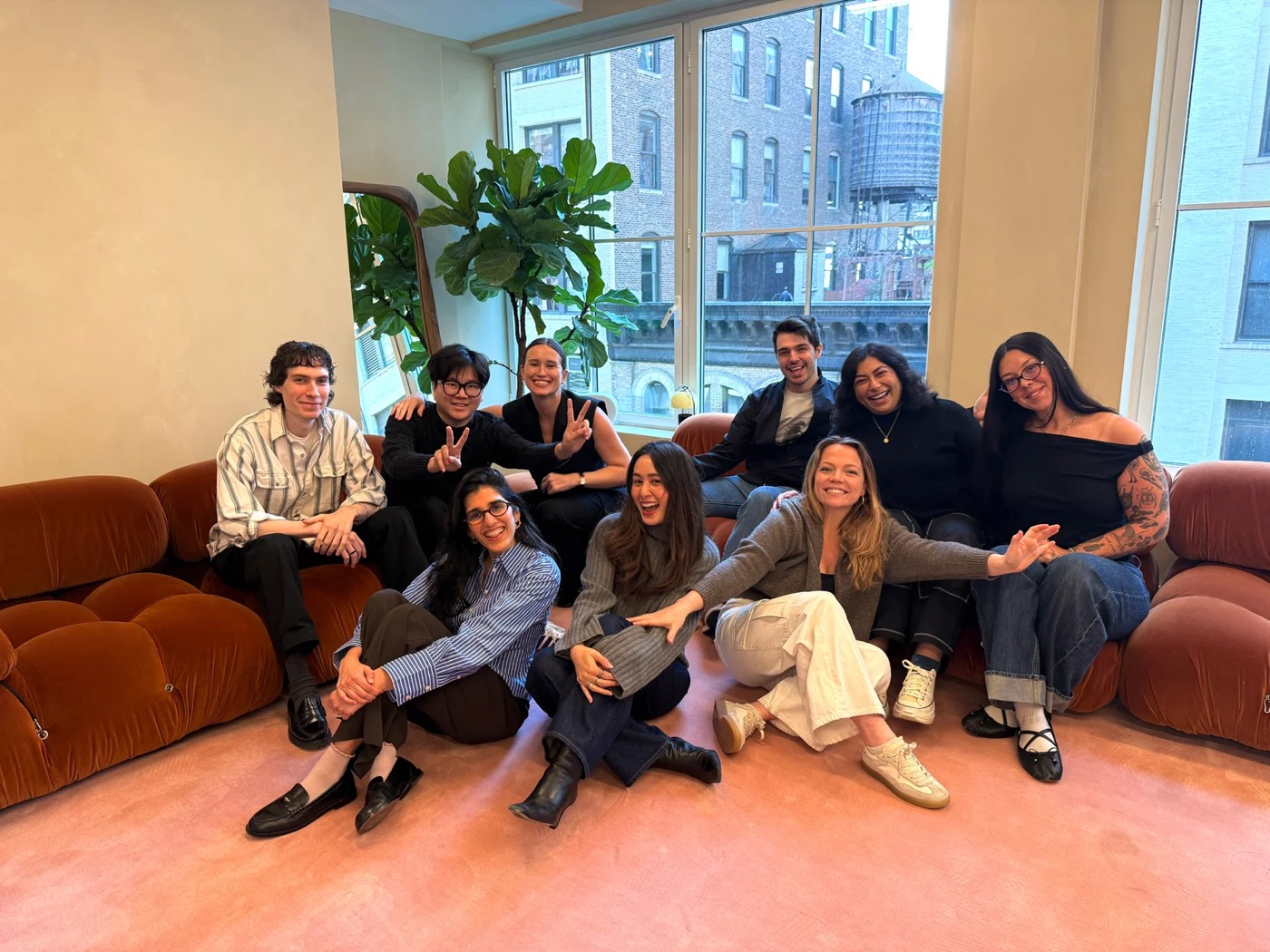 The Plot team on a couch in their New York office